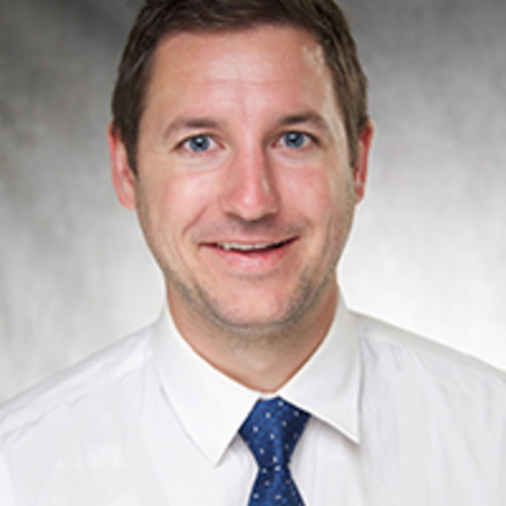 Nicholas Trapp photograph, white shirt, blue tie